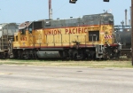 Remote control UP unit works yards next to petro plants along Shreveport's Jewella Avenue, near the Libby Glass plant.